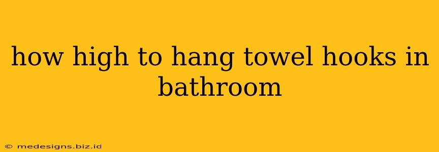 how high to hang towel hooks in bathroom